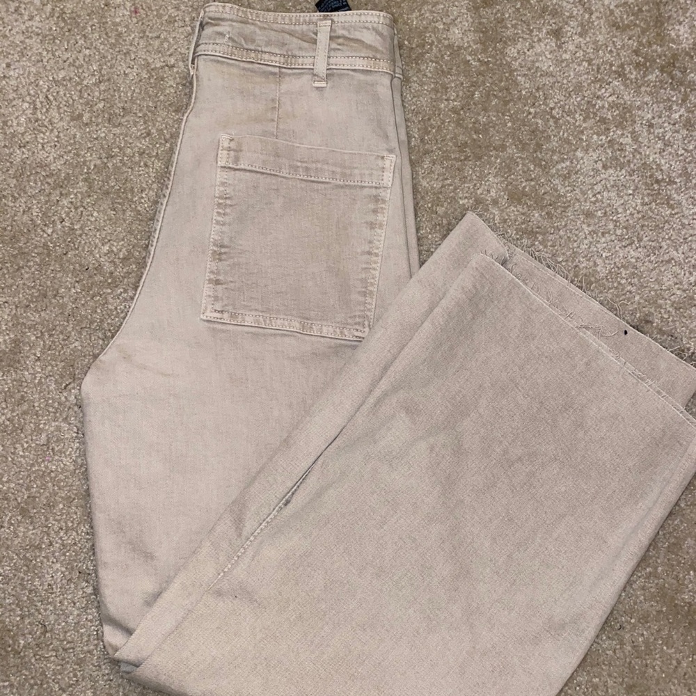 Wide legged beige denim jeans